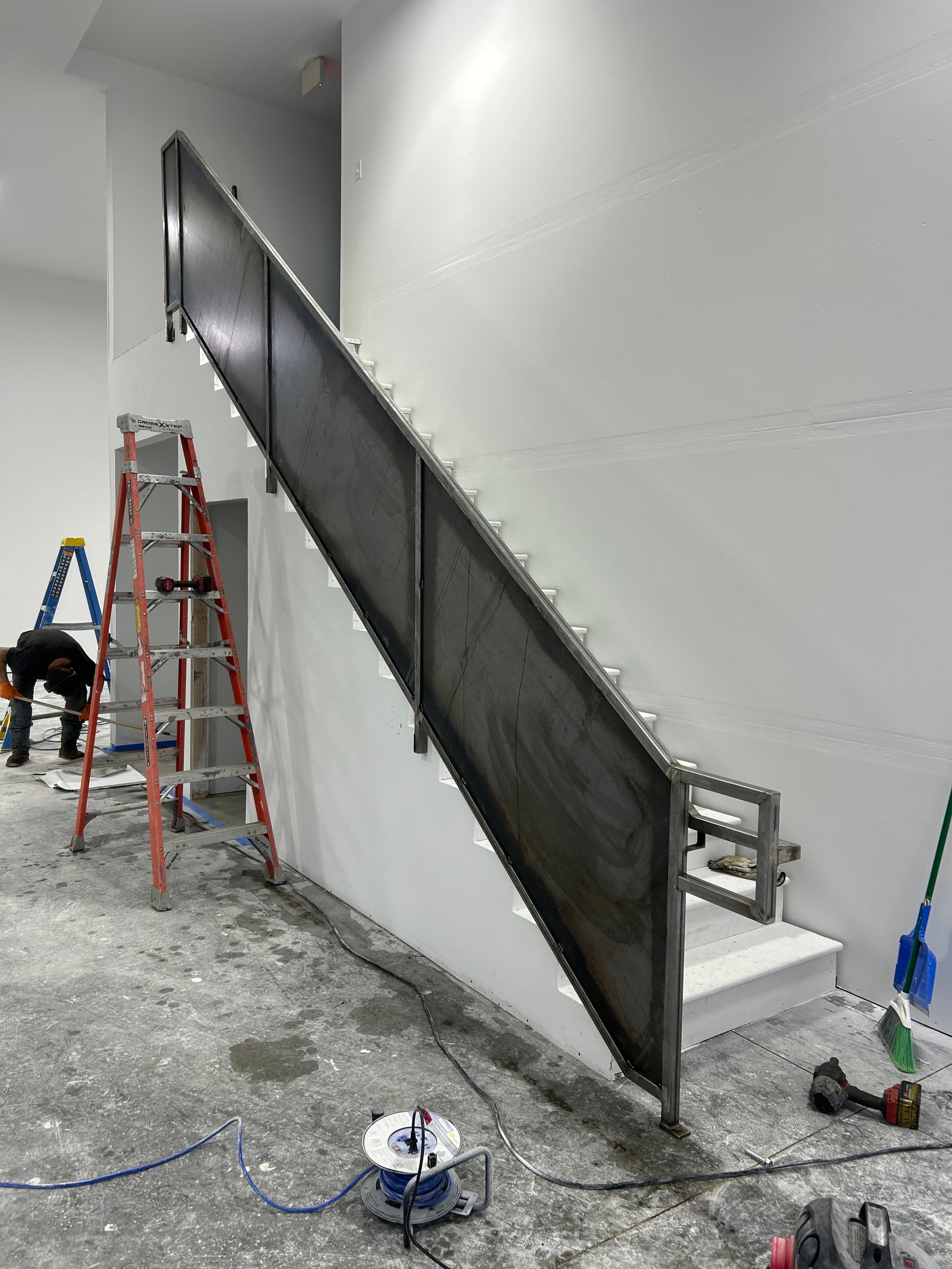 Crafting Industrial Elegance with Our Latest Staircase Build image